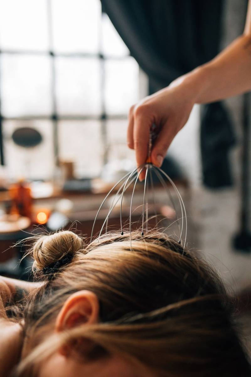 Head-spa scalp massager in use