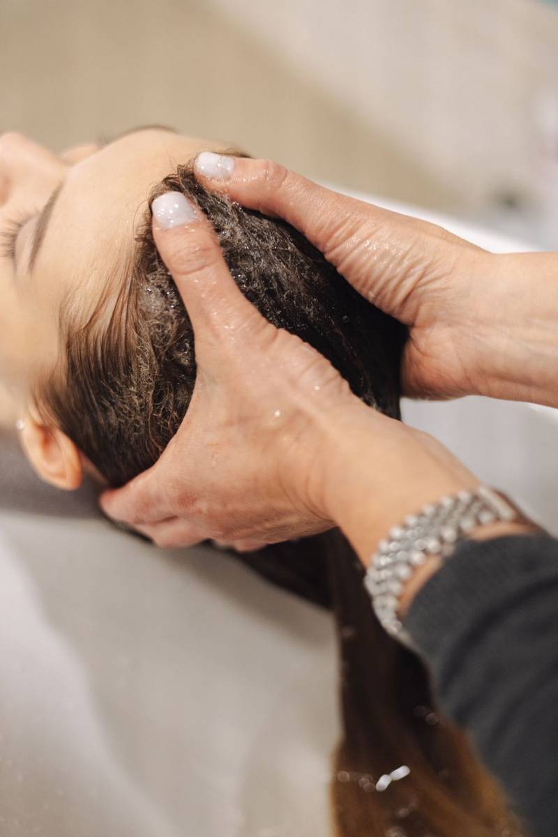Relaxing scalp massage at the shampoo bowl
